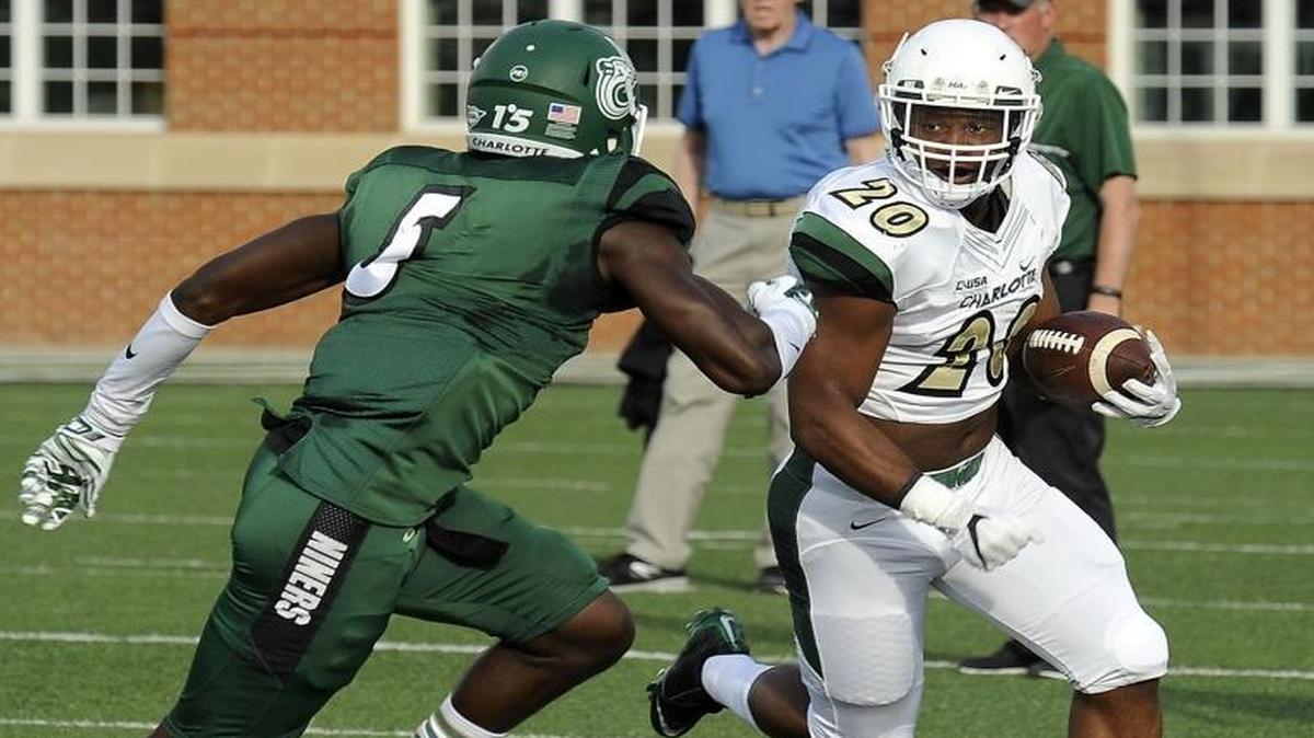 Charlotte 49ers running back Robert Washington (right) will return for his sophomore season after rushing for 489 yards and five touchdowns last season.