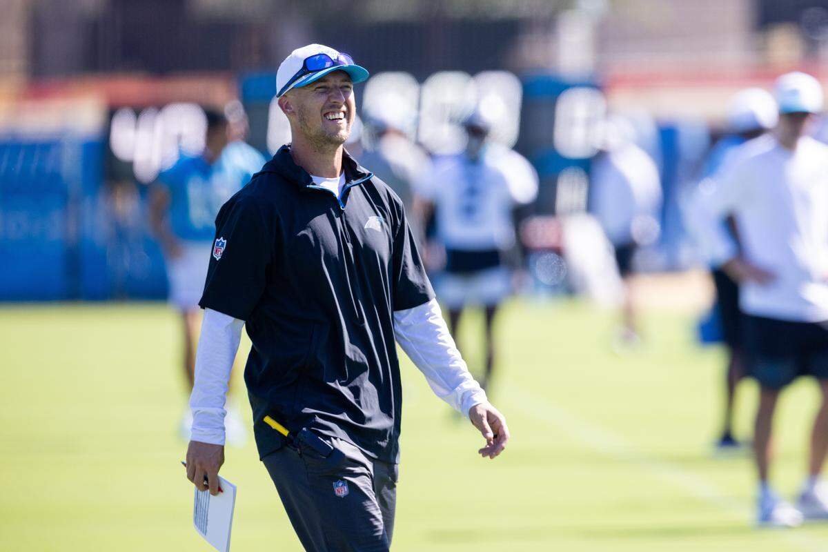 Jul 26, 2025; Charlotte, NC, USA; Carolina Panthers offensive coordinator Brad Idzik watches practice during training camp. Mandatory Credit: Scott Kinser-Imagn Images