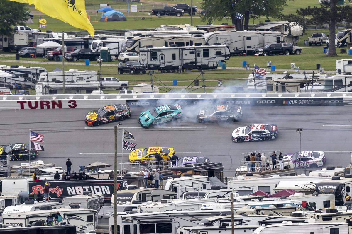 Apr 23, 2023; Talladega, Alabama, USA; NASCAR Cup Series driver Austin Dillon (3) works away from a collision with NASCAR Cup Series driver Zane Smith (38) as NASCAR Cup Series driver Austin Hill (62) has nowhere to go on lap 141 at Talladega Superspeedway. Mandatory Credit: Vasha Hunt-USA TODAY Sports