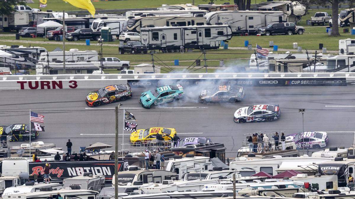 Apr 23, 2023; Talladega, Alabama, USA; NASCAR Cup Series driver Austin Dillon (3) works away from a collision with NASCAR Cup Series driver Zane Smith (38) as NASCAR Cup Series driver Austin Hill (62) has nowhere to go on lap 141 at Talladega Superspeedway. Mandatory Credit: Vasha Hunt-USA TODAY Sports