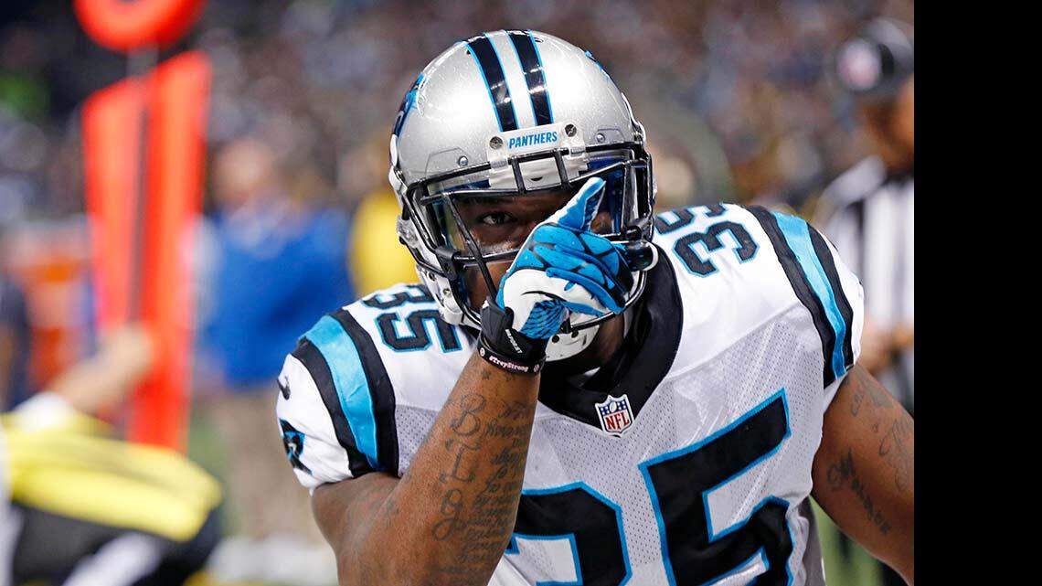 Carolina Panthers fullback Mike Tolbert (35) celebrates his touchdown in the first half of an NFL football game against the New Orleans Saints in New Orleans, Sunday, Dec. 6, 2015. (AP Photo/Bill Feig)