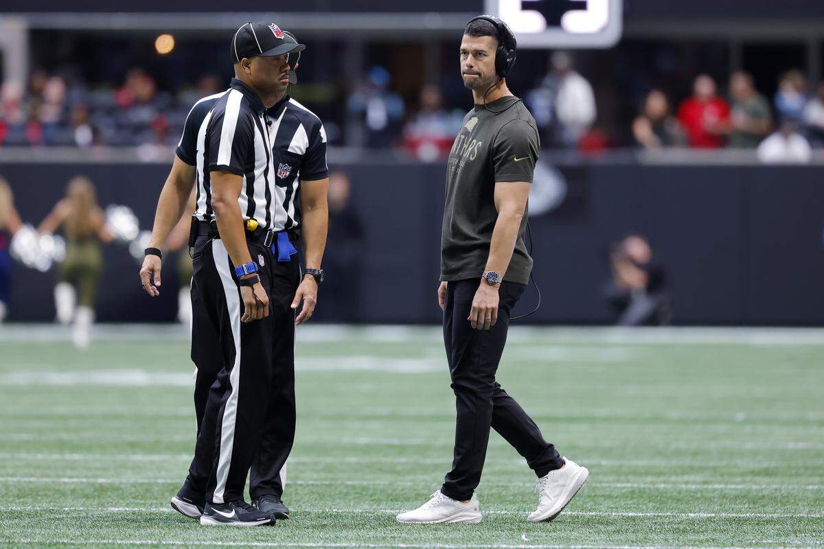 Coach Dave Canales of the Carolina Panthers speaks to the officials during Sunday’s second quarter against the Atlanta Falcons at Mercedes-Benz Stadium in Atlanta.