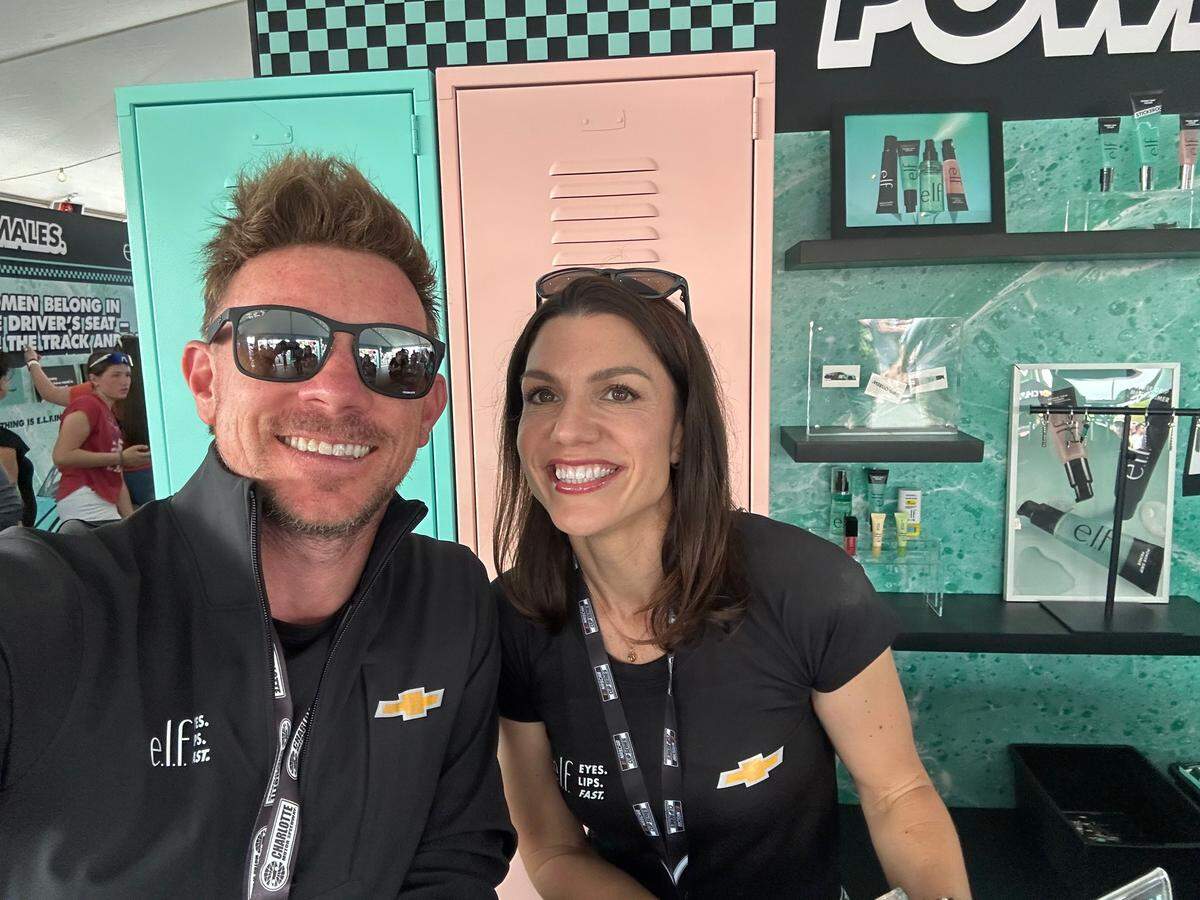 Katherine Legge (right) and her manager, Klint Briney (left), are in the midst of doing something historic and logistically unthinkable in today’s world of motorsports: completing The Double. Legge will be at the Indy 500 and then the Coca-Cola 600 at Charlotte Motor Speedway on Sunday, May 24, 2026.