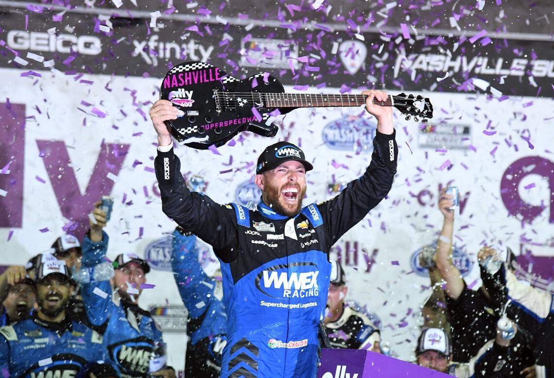 Jun 25, 2023; Nashville, Tennessee, USA; NASCAR Cup Series driver Ross Chastain (1) celebrates after winning the Ally 400 at Nashville Superspeedway. Mandatory Credit: Christopher Hanewinckel-USA TODAY Sports