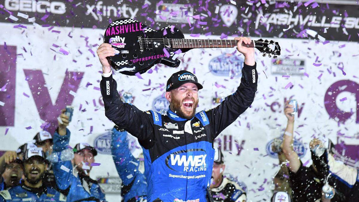 Jun 25, 2023; Nashville, Tennessee, USA; NASCAR Cup Series driver Ross Chastain (1) celebrates after winning the Ally 400 at Nashville Superspeedway. Mandatory Credit: Christopher Hanewinckel-USA TODAY Sports