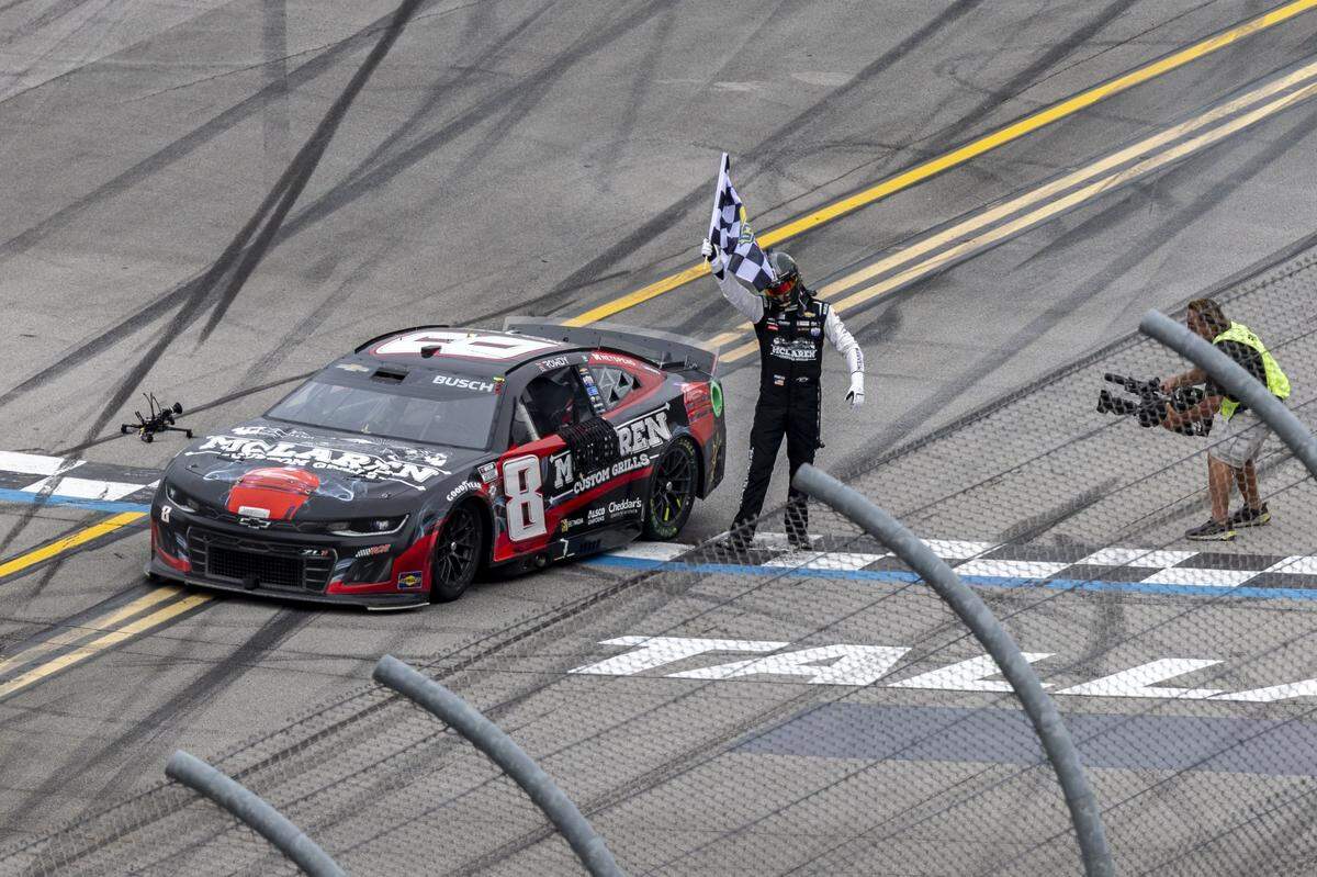 Apr 23, 2023; Talladega, Alabama, USA; NASCAR Cup Series driver Kyle Busch (8) celebrates on the finish line after an overtime win at Talladega Superspeedway. Mandatory Credit: Vasha Hunt-USA TODAY Sports