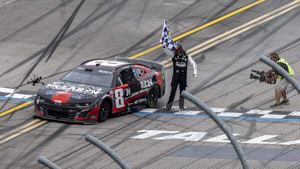 Apr 23, 2023; Talladega, Alabama, USA; NASCAR Cup Series driver Kyle Busch (8) celebrates on the finish line after an overtime win at Talladega Superspeedway. Mandatory Credit: Vasha Hunt-USA TODAY Sports