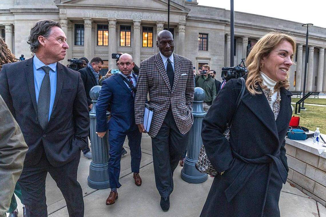 Michael Jordan, co-owner of 23XI Racing, leaves the Charles R. Jonas Federal Building on Dec. 1, 2025, in Charlotte, North Carolina. Jury selection and an opening statement began an antitrust lawsuit filed by Jordan’s 23XI Racing team against NASCAR.
