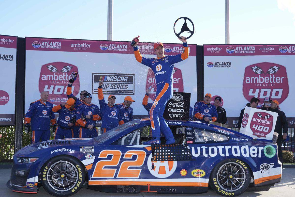 Mar 19, 2023; Hampton, Georgia, USA; NASCAR Cup Series driver Joey Logano (22) celebrates in Victory Lane at Atlanta Motor Speedway. Mandatory Credit: David Yeazell-USA TODAY Sports