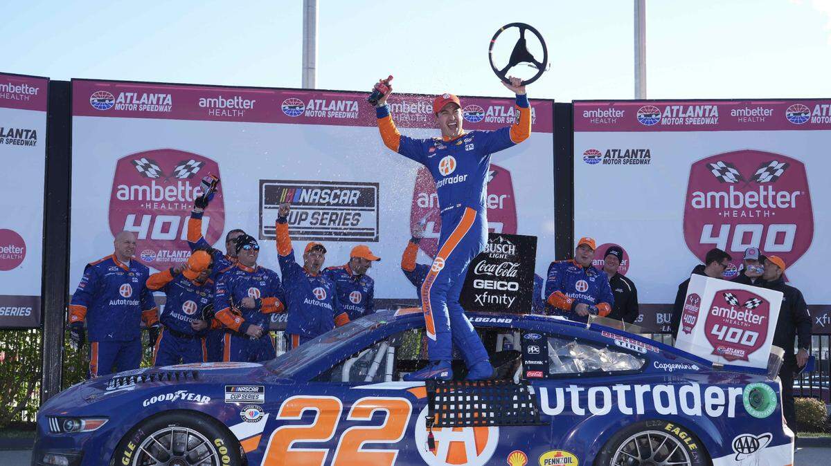 Mar 19, 2023; Hampton, Georgia, USA; NASCAR Cup Series driver Joey Logano (22) celebrates in Victory Lane at Atlanta Motor Speedway. Mandatory Credit: David Yeazell-USA TODAY Sports