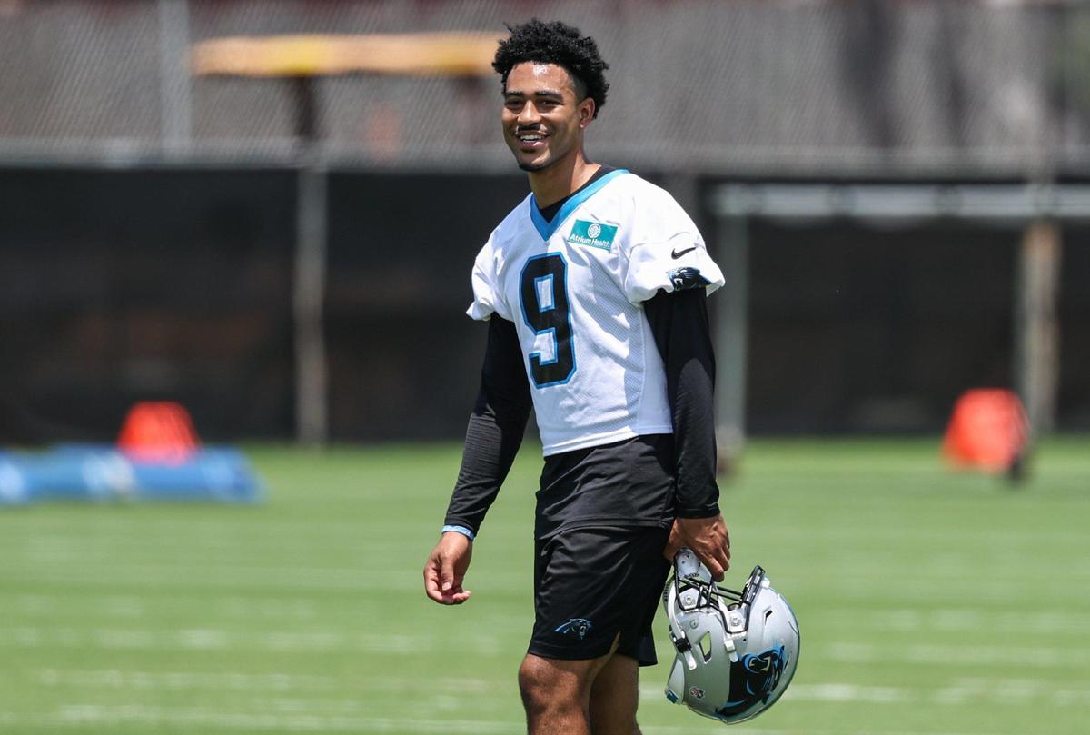 Panthers quarterback Bryce Young gives a big smile to teammates during the second day of minicamp in Charlotte, NC on Wednesday, June 11, 2025.