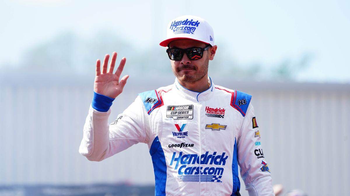 Apr 2, 2023; Richmond, Virginia, USA; Kyle Larson (5) reacts with fans before the race during the Toyota Owners 400 at Richmond Raceway. Mandatory Credit: John David Mercer-USA TODAY Sports
