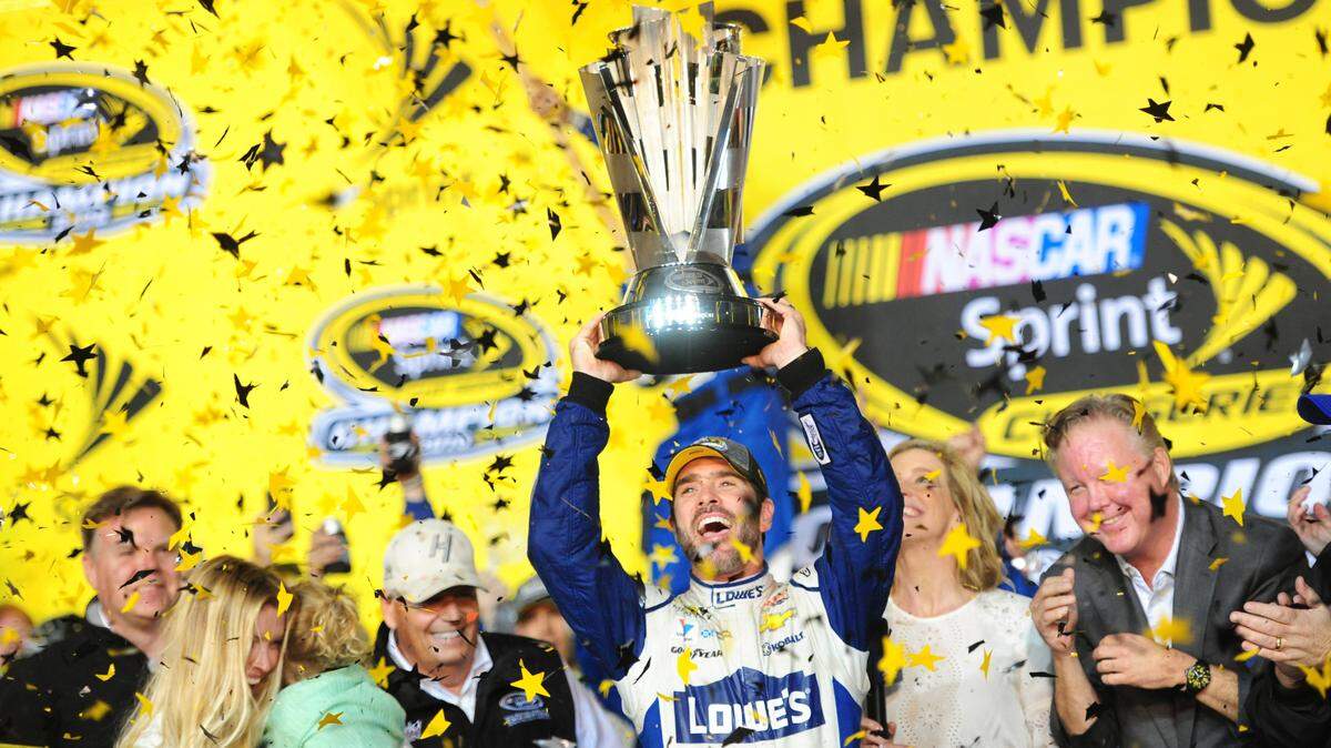 Jimmie Johnson celebrates winning the Ford EcoBoost 400 NASCAR Sprint Cup Championship race on Sunday, Nov. 20, 2016 at Homestead-Miami Speedway in Florida. (Joe Cavaretta/Sun Sentinel/TNS)