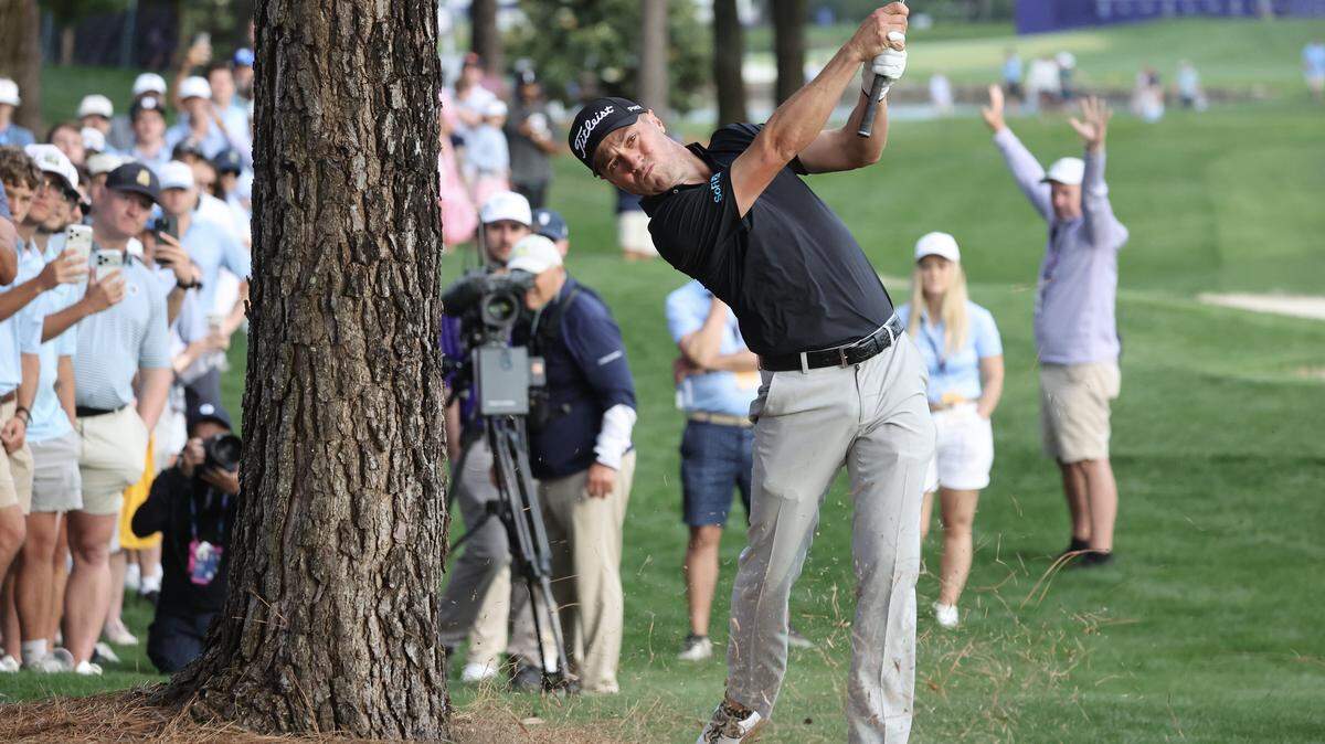 Justin Thomas of Kentucky hits from beneath the trees Saturday, May 9 at the 2026 Truist Championship at Quail Hollow Club in Charlotte.