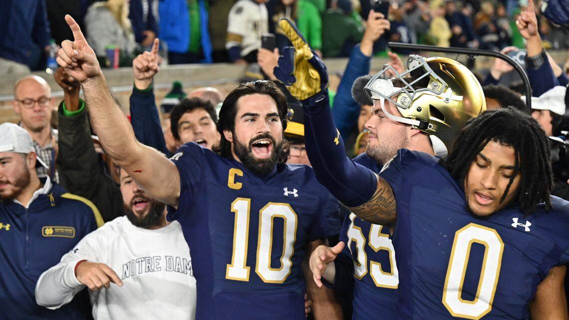 Oct 14, 2023; South Bend, Indiana, USA; Notre Dame Fighting Irish quarterback Sam Hartman (10) celebrates after Notre Dame defeated the USC Trojans at Notre Dame Stadium. Mandatory Credit: Matt Cashore-USA TODAY Sports