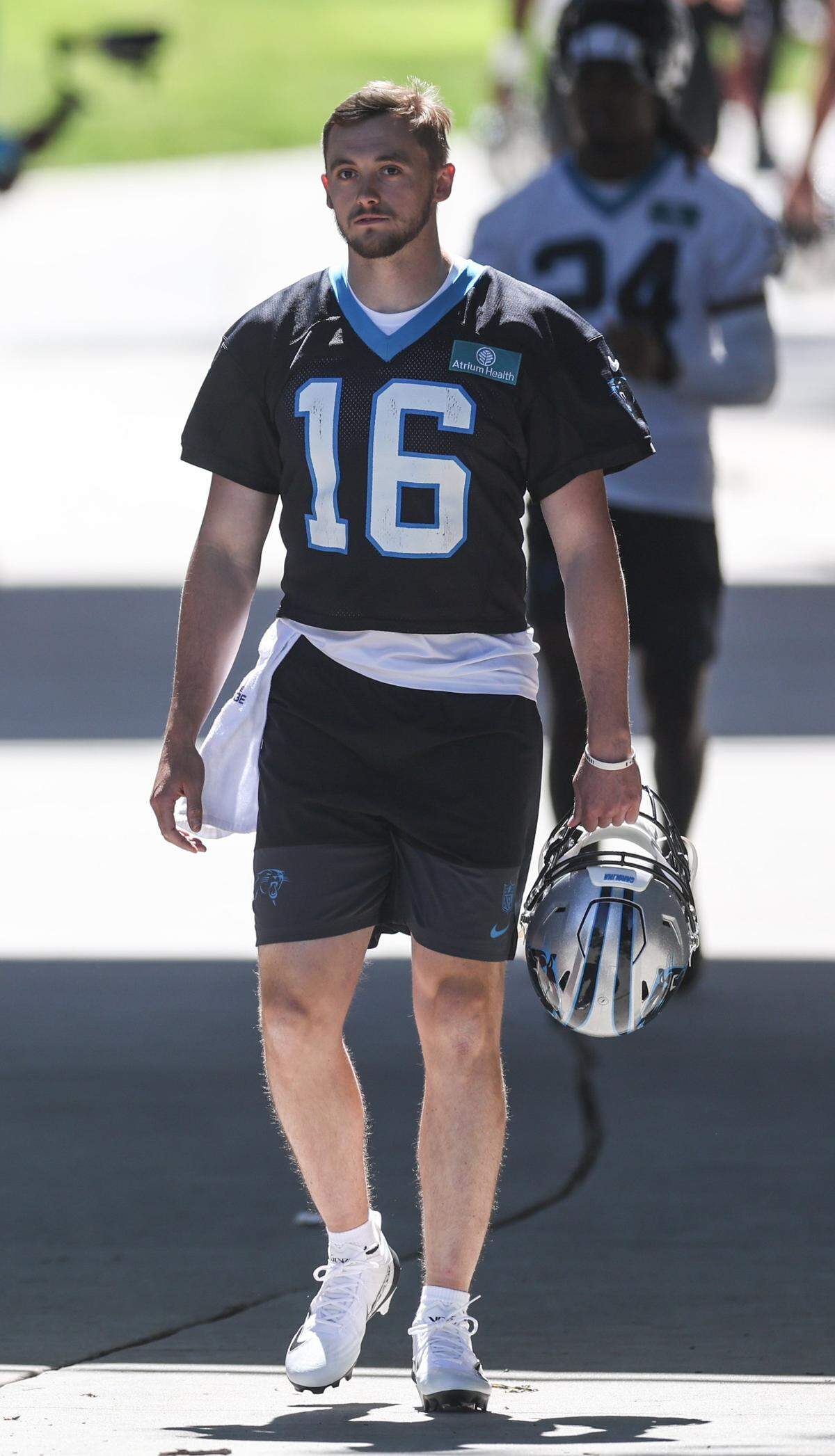 Quarterback Haynes King walks from Bank of America Stadium to the Carolina Panthers practice facility for rookie minicamp on Friday, May 8, 2026.
