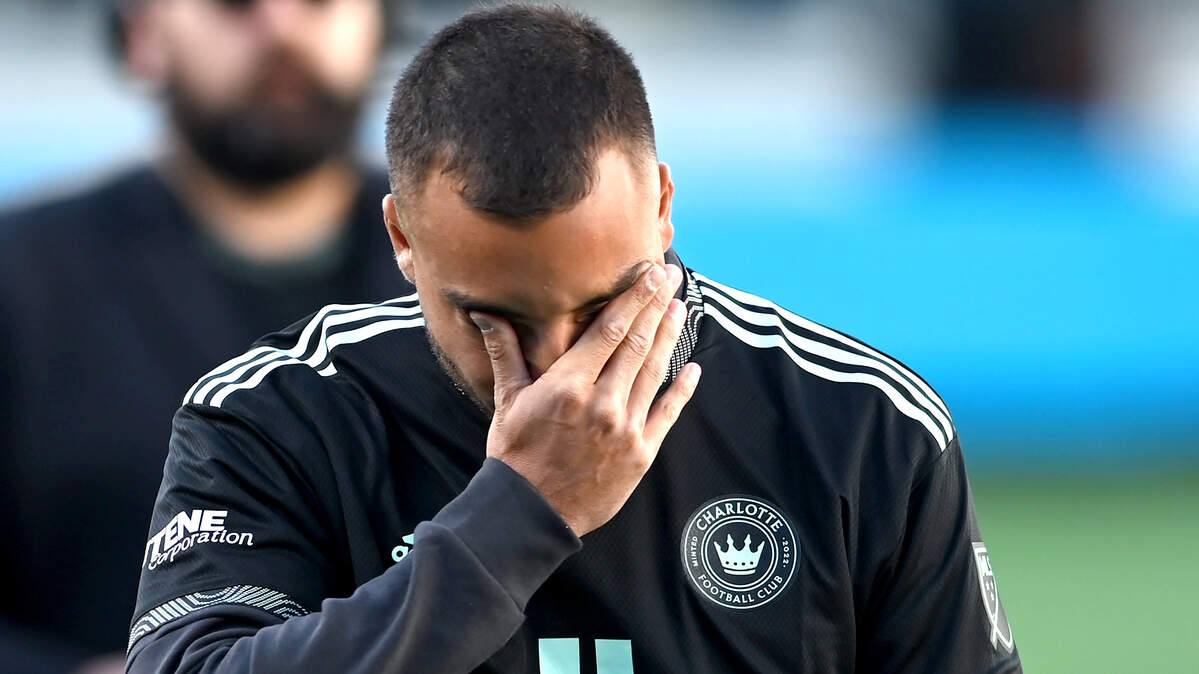 The Charlotte FC’s Andre Shinyashiki mourns the loss of his teammate Anton Walkes during a celebration of Walkes’ life at Bank of America Stadium on Tuesday, January 24, 2023. Walkes was a Charlotte FC defender who died from injuries he suffered in a boating accident near the Miami Marine Stadium Basin in Florida on Thursday, January 19, 2023.