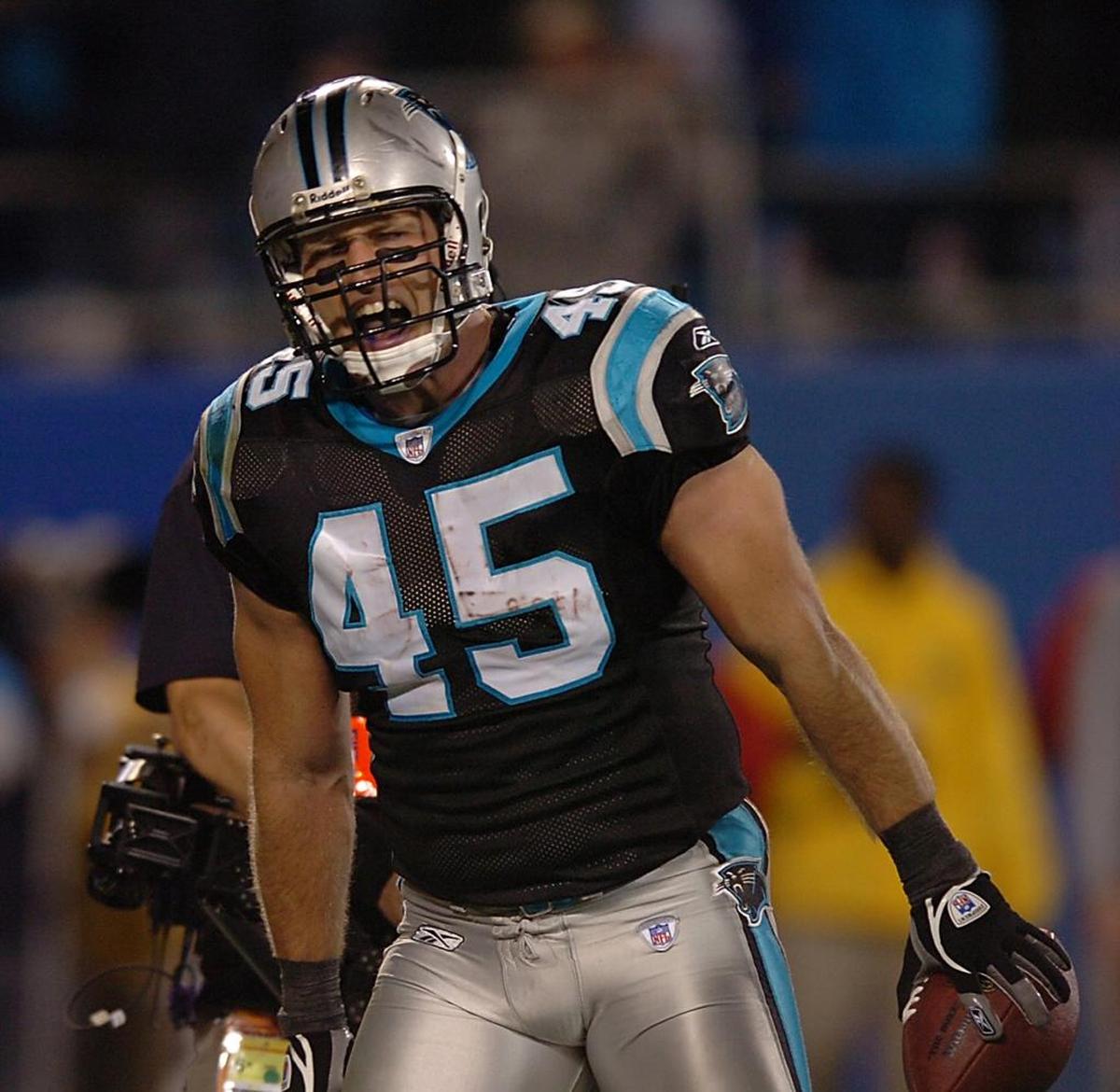 In 2006, Carolina running back Brad Hoover (45) celebrates his third quarter touchdown against Tampa Bay on Monday Night Football. Now retired, Hoover is coaching high school football in Concord.