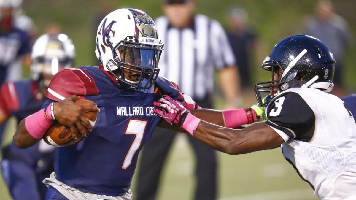 Mallard Creek quarterback James Smith, left, and Hough defensive back Marquill Osborne played big roles in the teams’ conference game last month.
