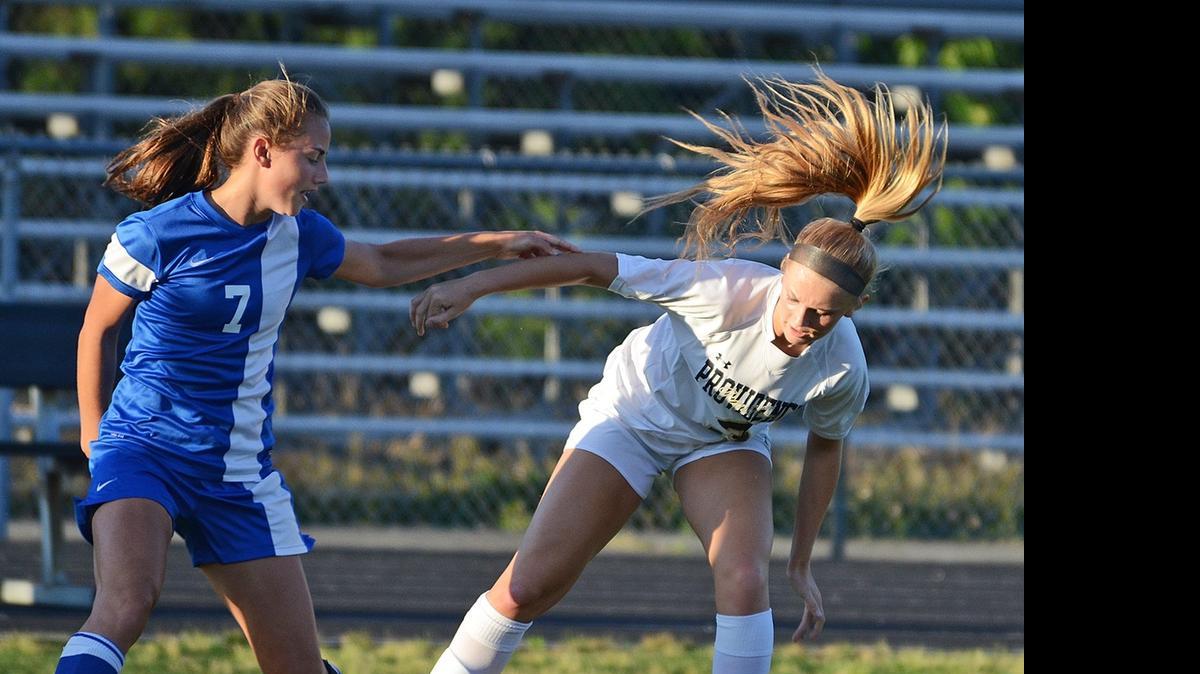 
Ragsdale's Sandra Geiselhart, left, and Providence's Lauren Ellis  try to gain control of the ball during t a May 22 girls soccer match in the fourth round of the N.C. 4A playoffs .
