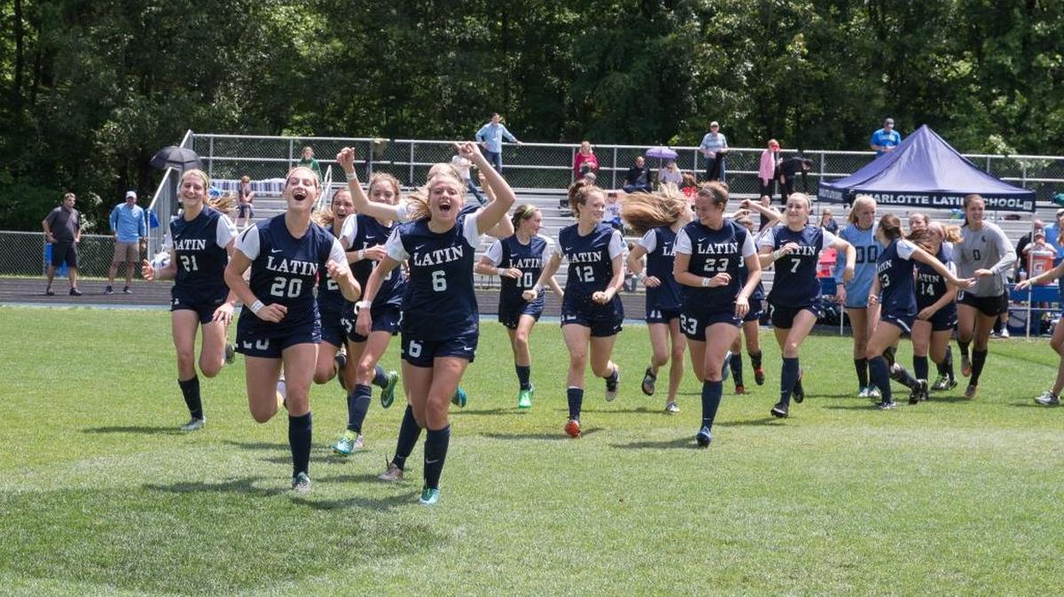 Charlotte Latin celebrates winning the NCISAA girls soccer state title Saturday