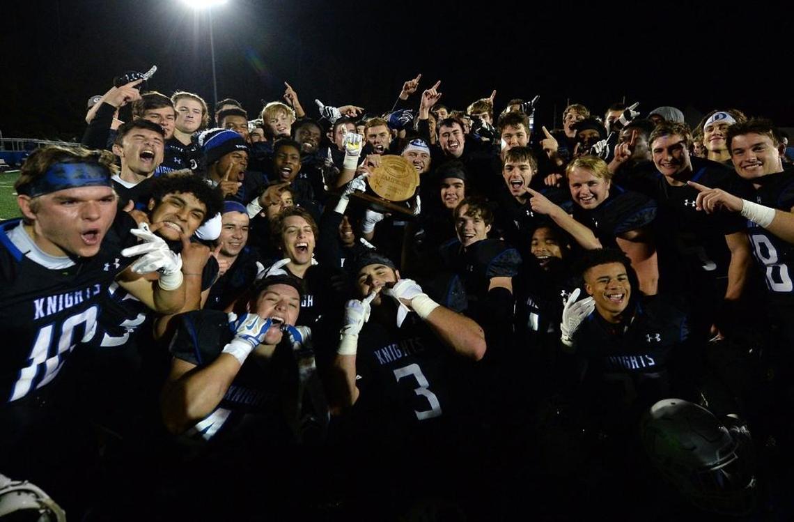 The Charlotte Christian Knights celebrate their victory over the Providence Day Chargers on Friday, November 10, 2017 to win the NCISAA football championship. Charlotte Christian defeated Providence Day 47-21.