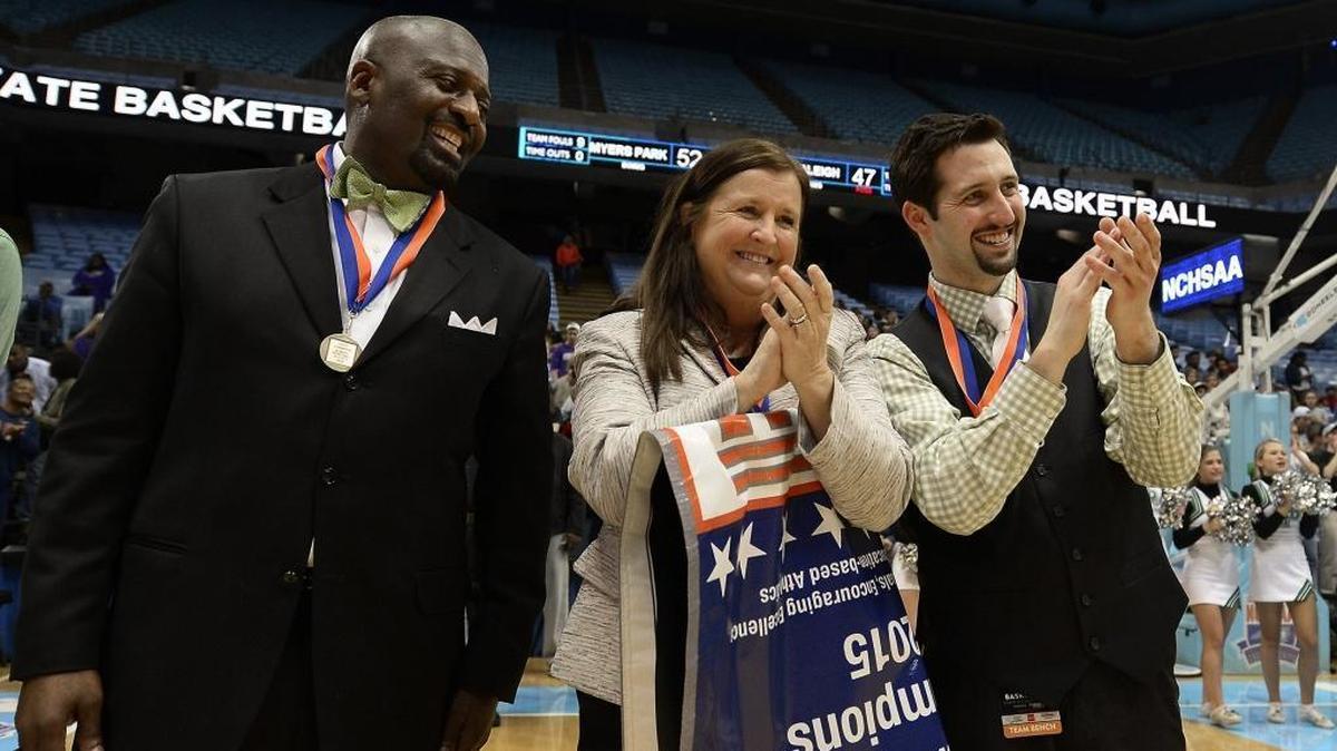 (Center) Myers Park Mustangs head coach Barbara Nelson has led her team to two NCHSAA state championships. Friday night, she’ll try to lead her Mustangs to an upset of Sweet 16 No. 2 Ardrey Kell
