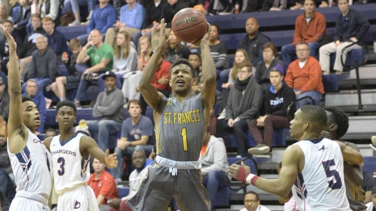 St. Frances' Adrian Baldwin (1) shoot over the Providence Day defense during their game in the 2017 Hoodie's House High School Hoops Classic on Thursday, December 28, 2017.