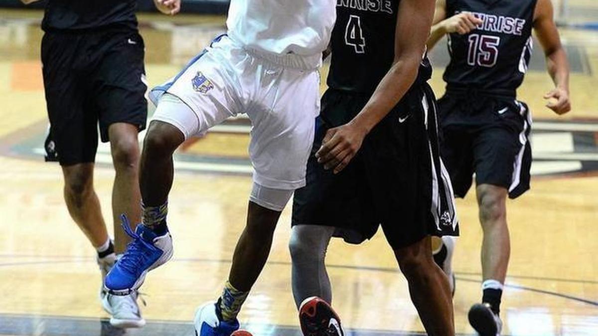Carmel Christian’s Shawn Morrison Jr. attempts a shot at the Hoodies House national tournament at Providence Day Wednesday