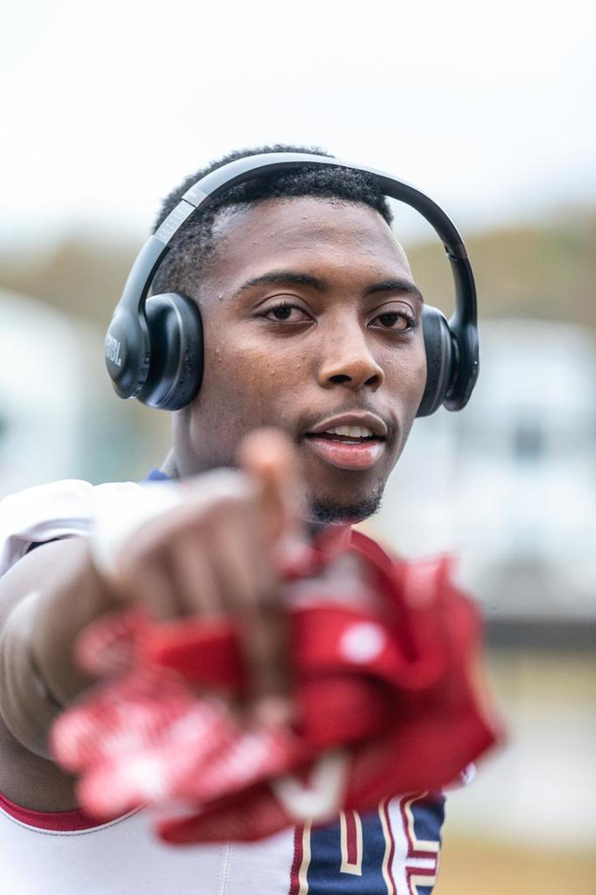 Mallard Creek defensive end J.T. Whitmore goes through his pre-game routine before Friday’s game with Hough