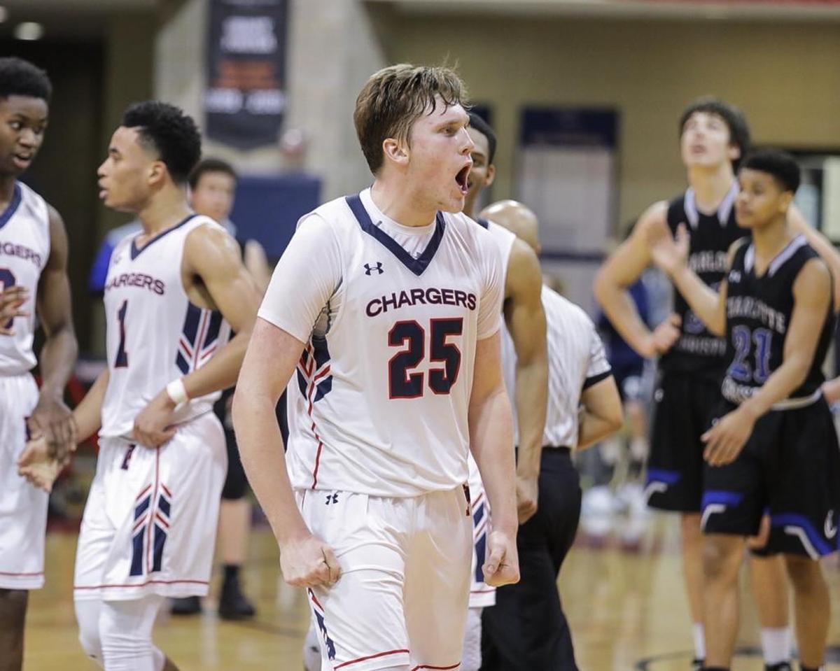 Providence Day's John Miralia (25) would get a key rebound late in the fourth quarter. Providence Day advanced to the NCISAA 3A semifinals by defeating Charlotte Christian on Friday.