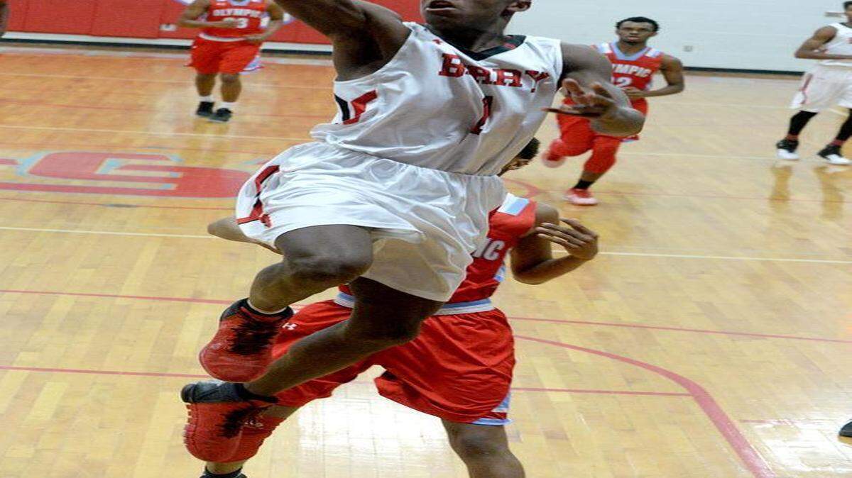Berry #1 Jael Scott scores a basket in Thursday's Olympic vs. Berry semifinals in the SoMeck 8 tournament at Charlotte Catholic.