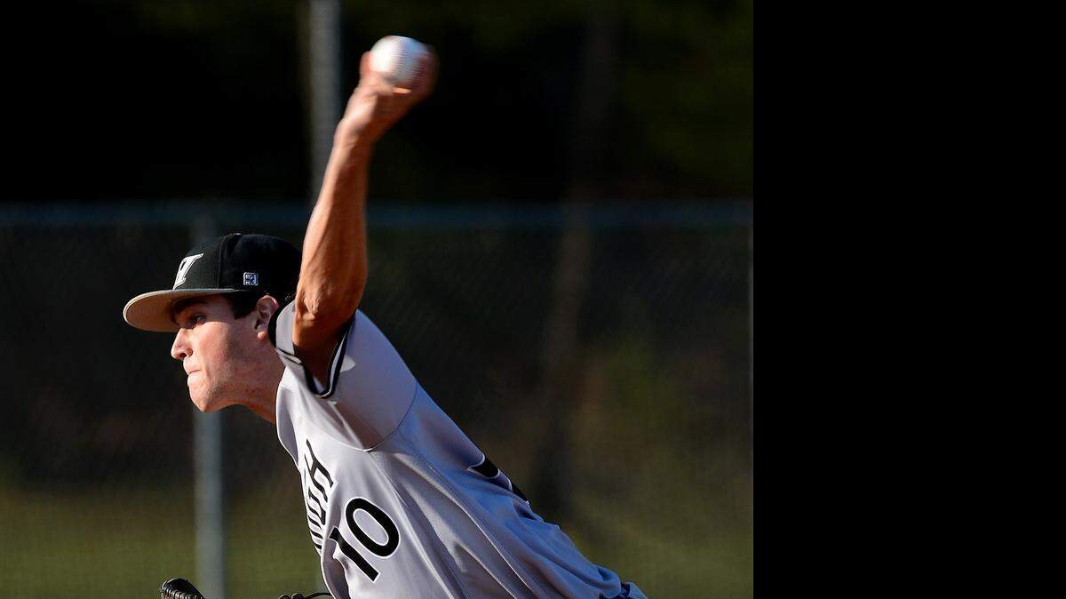 
Hough High pitcher Nicholas Swiney delivers a pitch to a Vance High batter during action on Friday, May 1, 2015 at Vance High School in Charlotte, NC.
