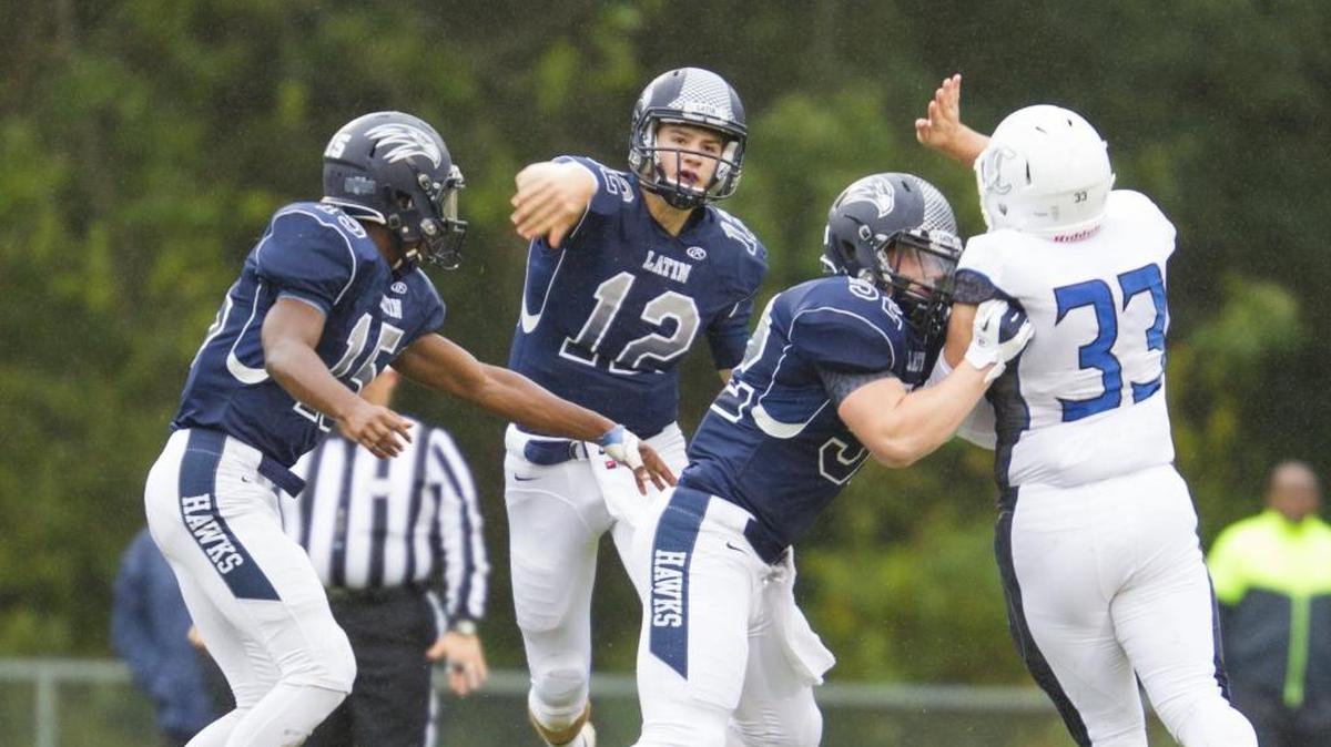 Charlotte Latin quarterback Bates Jones (12) and the Hawks will play Davidson Day for the NCISAA Division I football championship Friday night at Charlotte Christian.