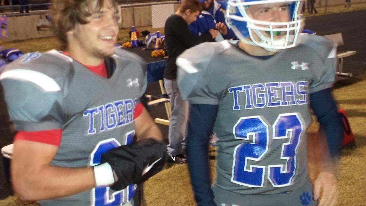 Mount Pleasant RB Cody Reece, left, with his brother Dylan, is one of the nation’s leading rushers this season