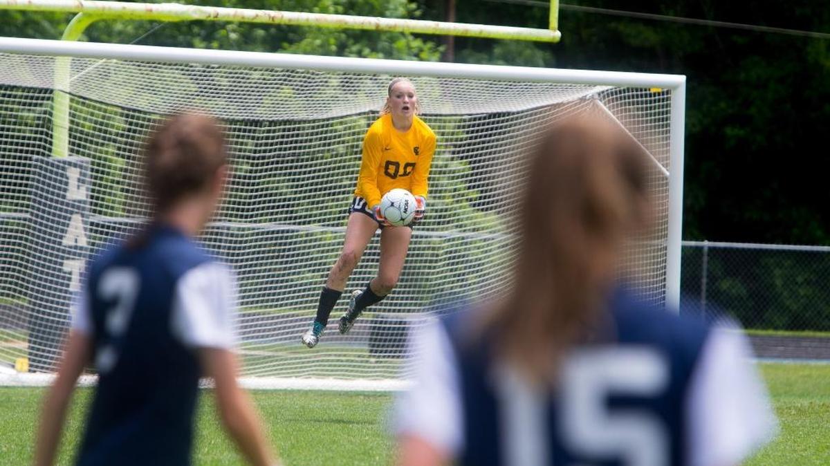 Charlotte Latin soccer goalie Claudia Dickey and the Hawks are state championship in the N.C. Independent Schools