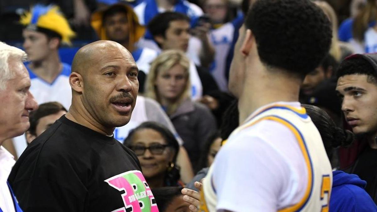 UCLA guard Lonzo Ball (right) visits with his father LaVar following a college basketball game against Washington State this month in Los Angeles.