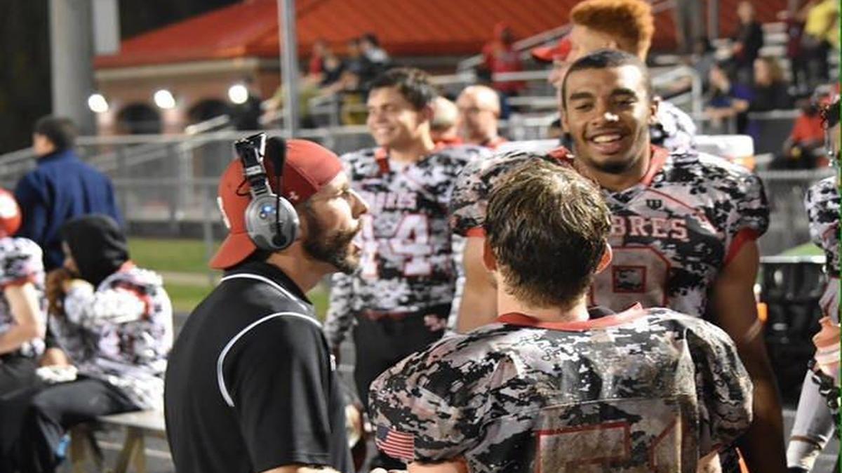 South Meck defensive lineman Jake Lawler (facing camera) committed to UNC Sunday
