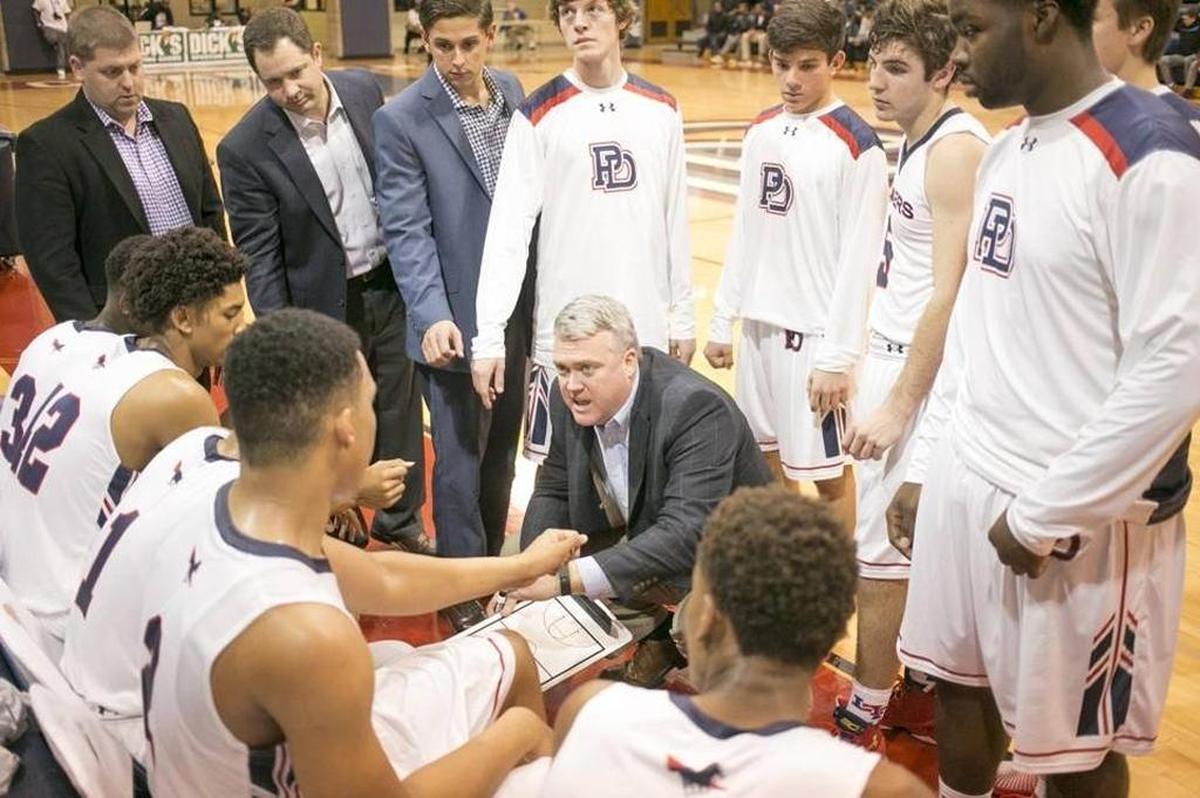 Providence Day boys basketball coach Brian Field has tied the school’s all-time wins record