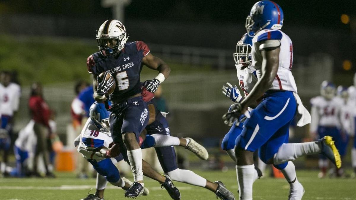 Mallard Creek senior running back Nasjzae Bryant finds room to run against the North Meck defense on Friday at Mallard Creek High School in Charlotte. Mallard Creek won 27-18 in a battle of I-Meck 4A conference rivals.