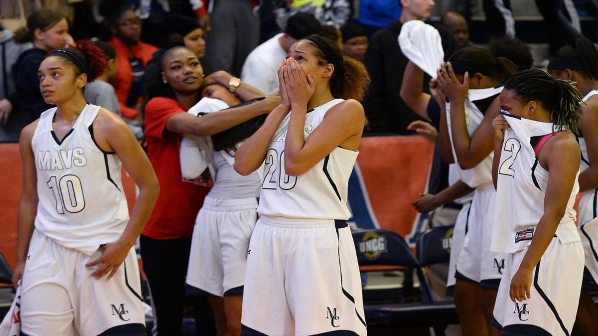 Mallard Creek players react to their loss against Northwest Guilford in the NCHSAA 4A Western Regional Championship game on Saturday. Northwest Guilford defeated Mallard Creek 59-58.