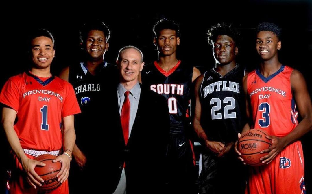 All-Mecklenburg boys’ basketball team (from left to right): Devon Dotson, Providence Day; BJ Mack, Charlotte Christian; Butler coach Myron Lowery; Bryant Thomas, South Mecklenburg; Gerrale Gates, Butler; Trey Wertz, Providence Day.