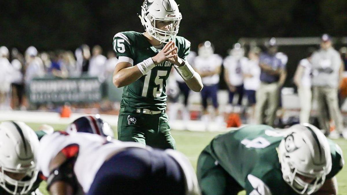 Charlotte Country Day sophomore QB Russell Tabor (15) led the Buccaneers in a CISAA conference game with rival Providence Day Friday
