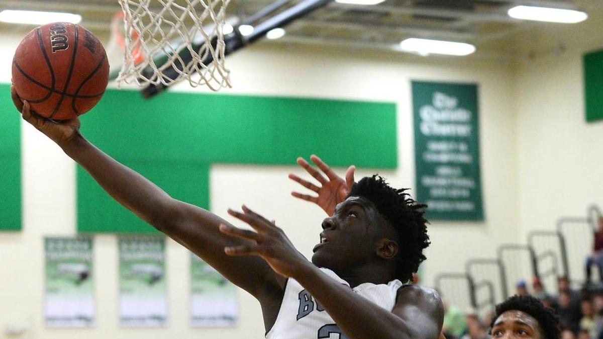 Butler Bulldogs Gerrale Gates, left, is one of the Charlotte Observer’s high school basketball players of the week