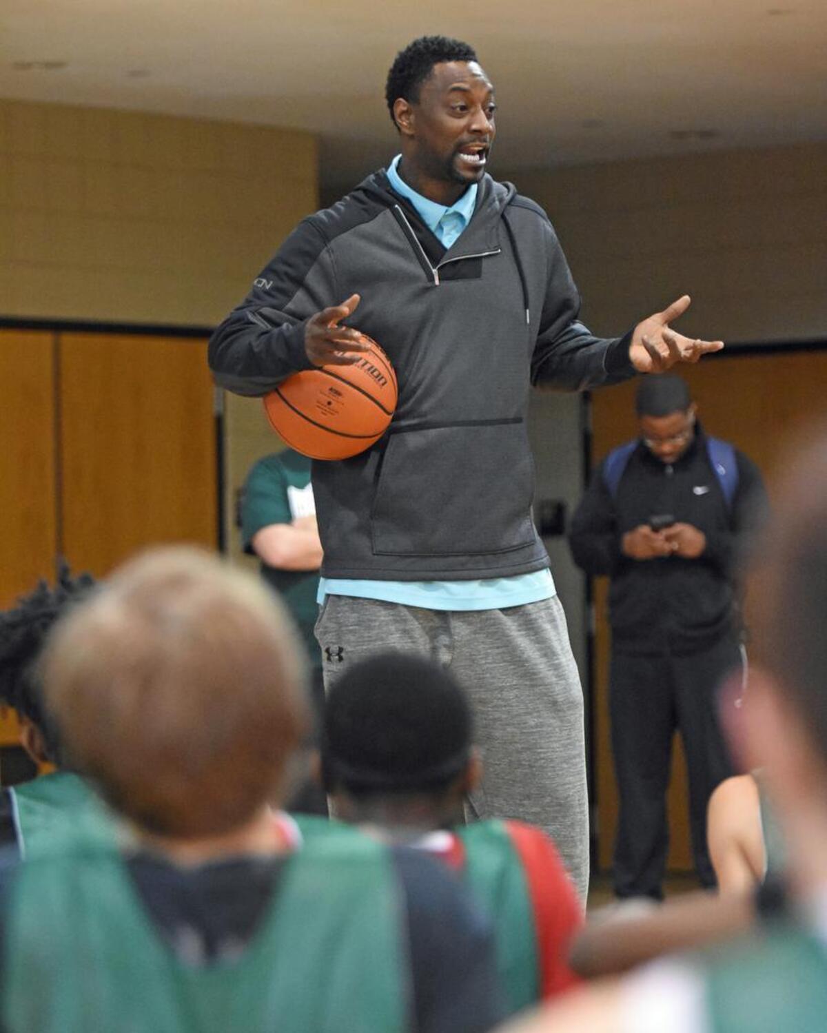 Former North Carolina and NBA player Jeff McInnis talks to the players before the start of the inaugural NCPreps.com Elite Guard Showcase, held at Providence Day on Saturday, March 26, 2016. The Elite Guard Showcase drew nearly 70 of the region’s top high school guards.