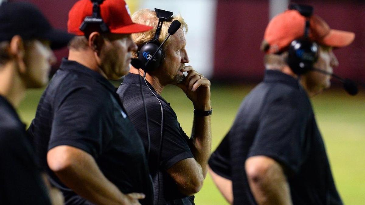 Charlotte Catholic head coach Mike Brodowicz, center, said his team really needed Friday’s 51-0 win over Ardrey Kell to get on track for the remainder of the season.