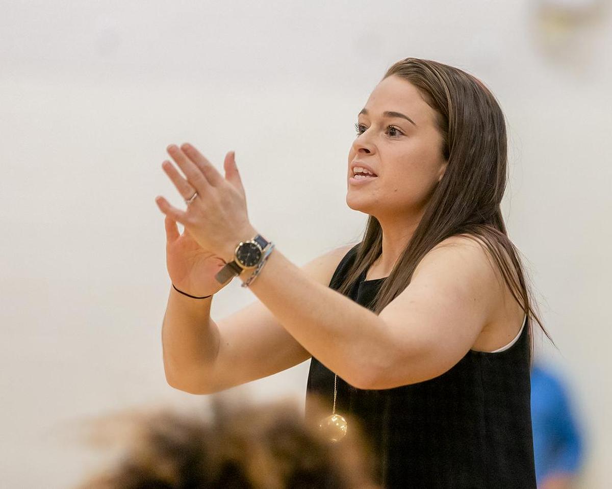 Independence High girls basketball coach Lauren Galvani appaluds her team’s effort Tuesday against Olympic.