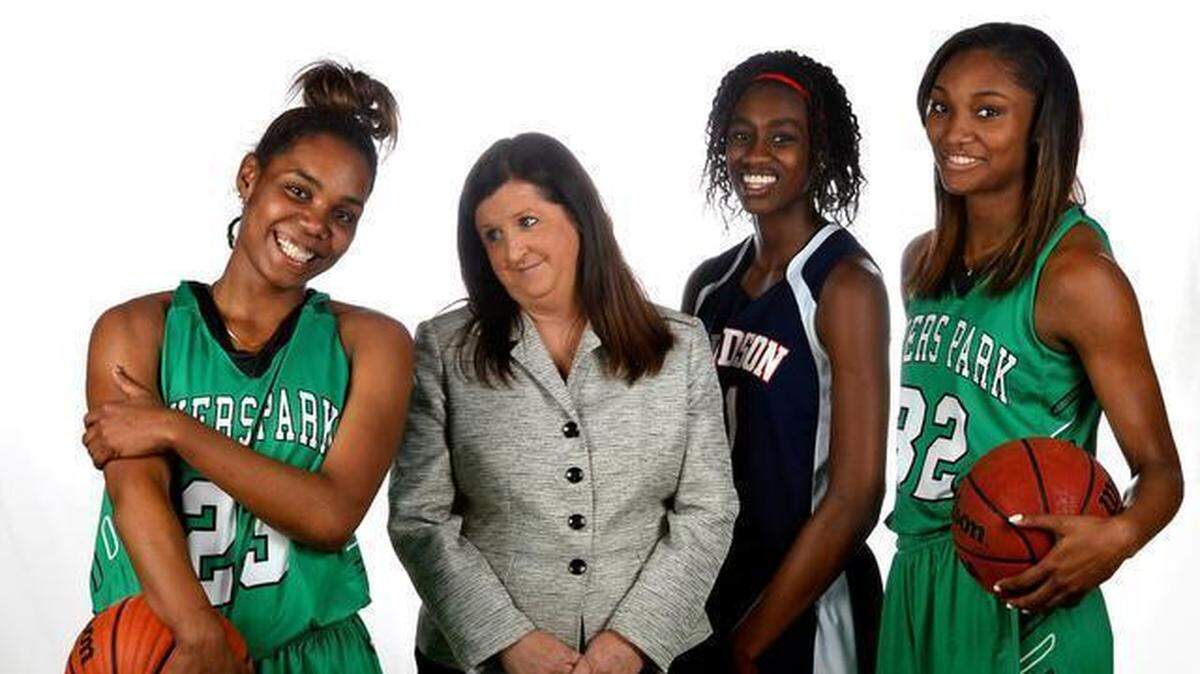 
All-Observer basketball team members and coach, from left, Aliyah Mazyck of Myers Park, head coach Barbara Nelson of Myers Park, Maya Caldwell of Davidson Day School and DD Rogers of Myers Park.
