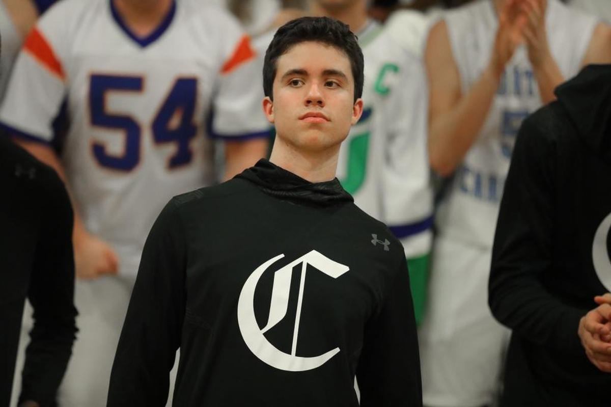 Charlotte Christian's JC Tharrington awaits the starting lineup announcements.