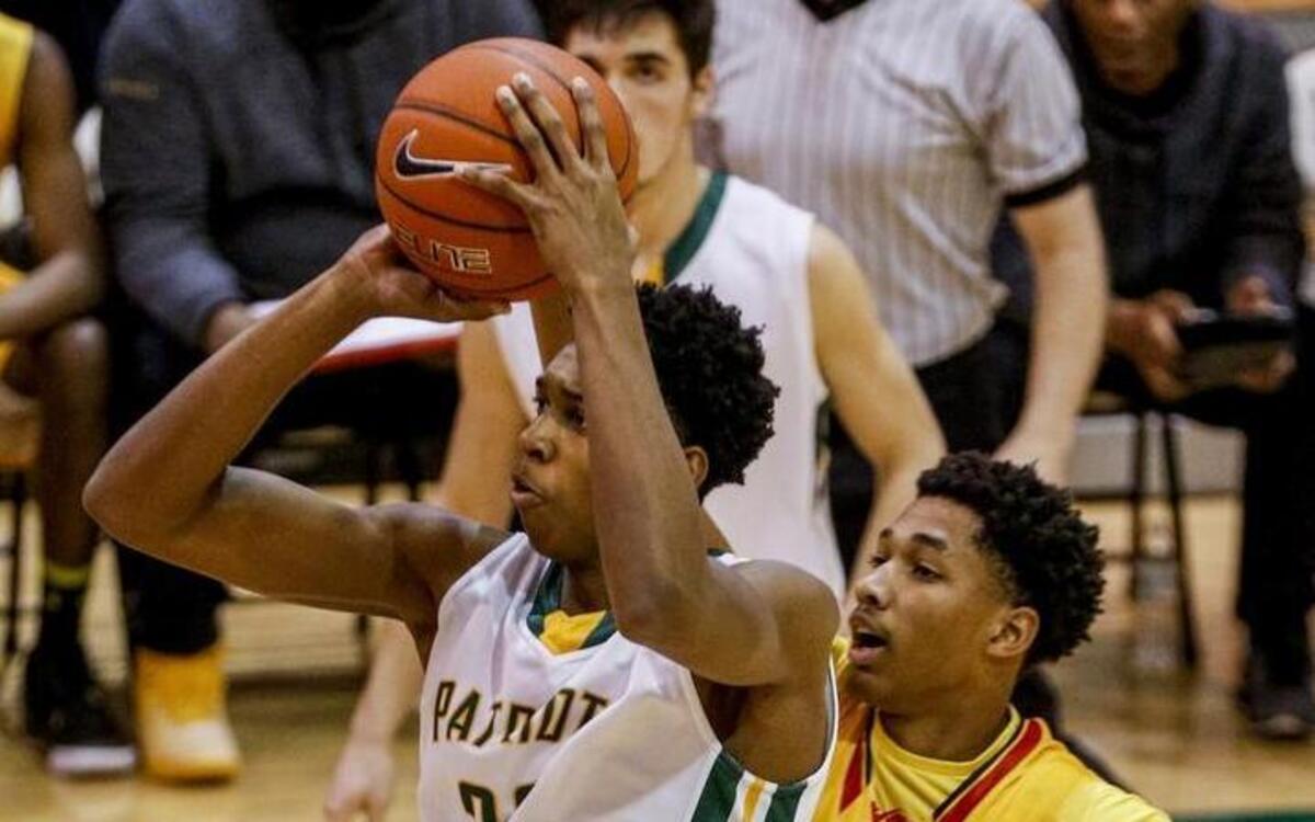 Independence forward Justyn Hamilton, left, shoots against Wesleyan Christian in the first half of the championship game at the BSN Sports Queen City Clash at Charlotte Country Day School in Charlotte, N.C., Friday, Dec. 23, 2016. (Nell Redmond photo)